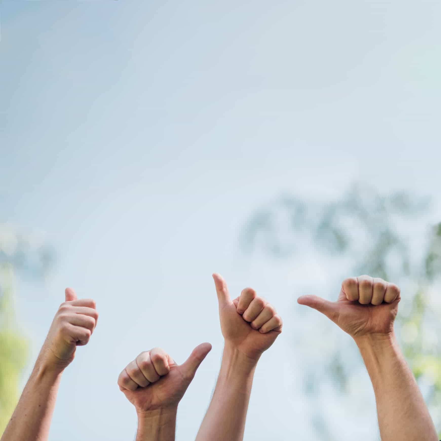 Lots of hands giving thumbs up